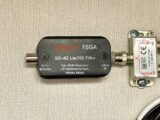 The filter unit attached to the co-ax TV adaptor