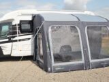 A motorhome with an awning erected
