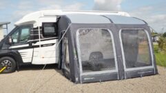 A motorhome with an awning erected