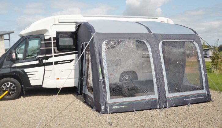 A motorhome with an awning erected