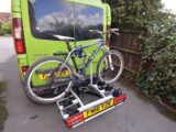 Metal bars clamped to the bike frame