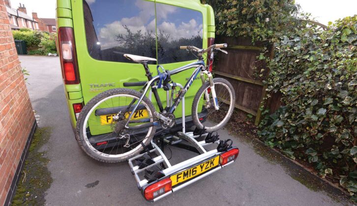 Metal bars clamped to the bike frame