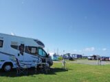 A motorhome pitched up on a campsite
