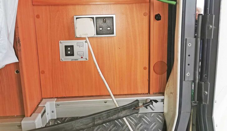 The grey-water control switch and a pair of 13A sockets