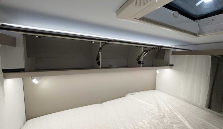 Lighting underneath the overhead lockers