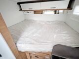 The transverse bed with lockers overhead