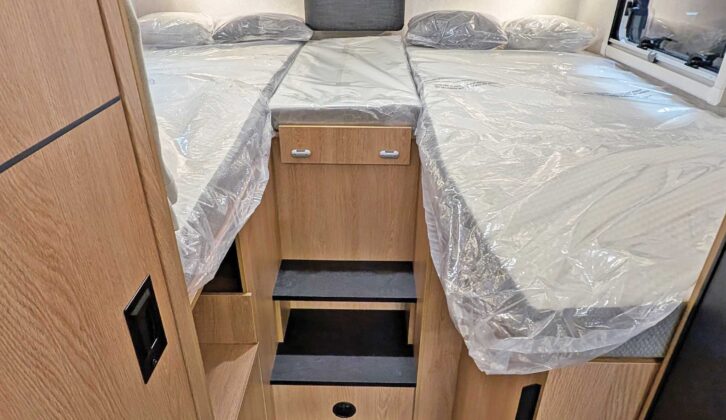 The bed at the rear of the 'van