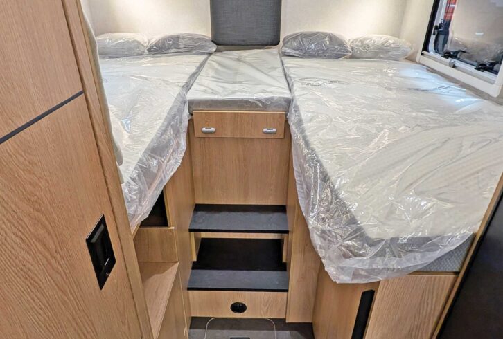 The bed at the rear of the 'van