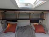 The rear beds and overhead lockers in the Joa by Pilote motorhome