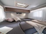 The rear beds in an Adria Compact Supreme