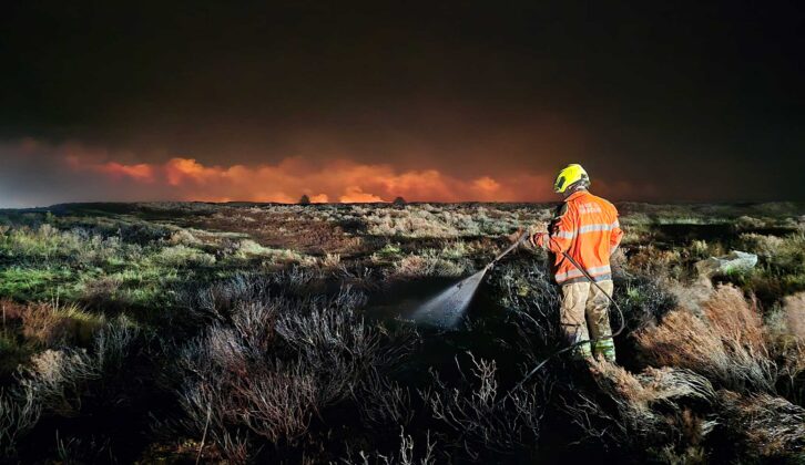 A firefighter tackling the blaze