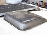 The rooflight aperture, next to solar panels
