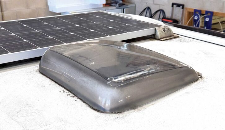 The rooflight aperture, next to solar panels