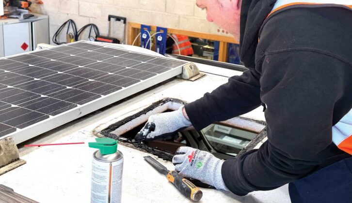 Cleaning the old sealant from the rooflight