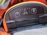 The controls on the battery bag