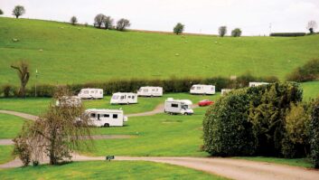 Motorhomes and caravans pitched up at Fir Tree Farm Campsite
