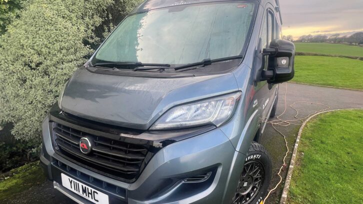 A campervan parked nose-in