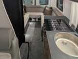 Looking down past the kitchen to the rear lounge in the B68