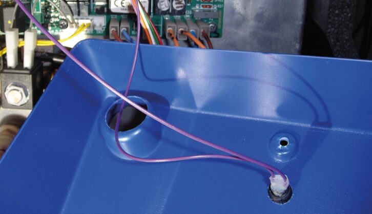 The wiring for the reset button