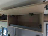 One of the overhead lockers at the front of the 'van