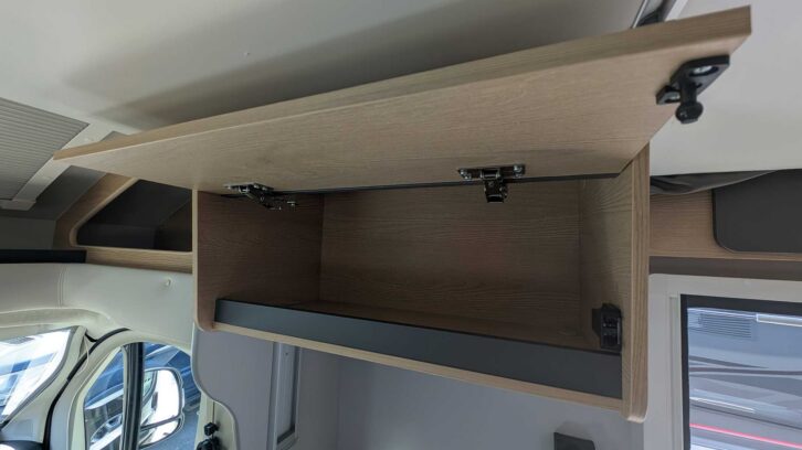 One of the overhead lockers at the front of the 'van