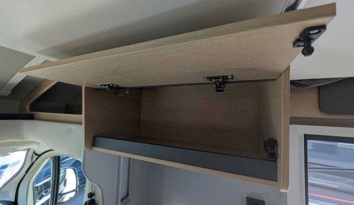 One of the overhead lockers at the front of the 'van