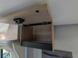 One of the overhead lockers in the front lounge