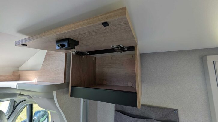 One of the overhead lockers in the front lounge