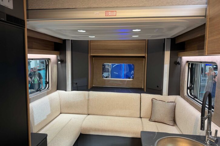 The rear lounge with the dropdown bed overhead in the 64-2