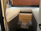 The fixed single beds in the 75-4T