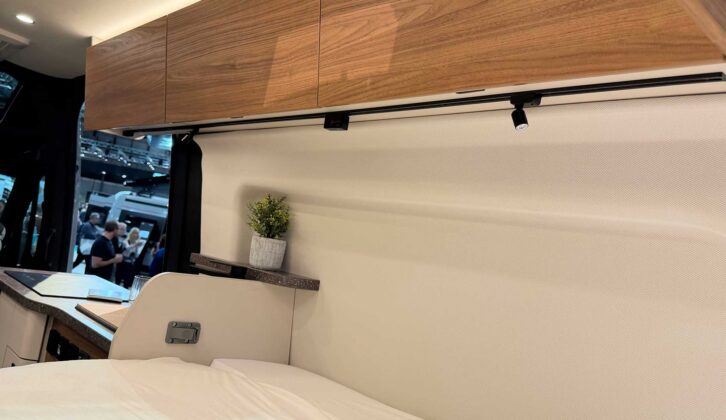 The lockers above the bed