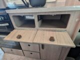 The locker and cupboard space by the kitchen