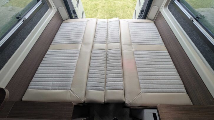 The bed made up from the settees