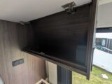 The overhead locker in the kitchen