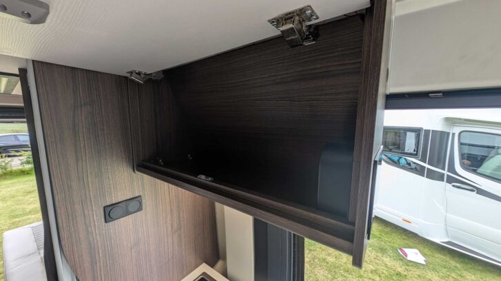 The overhead locker in the kitchen
