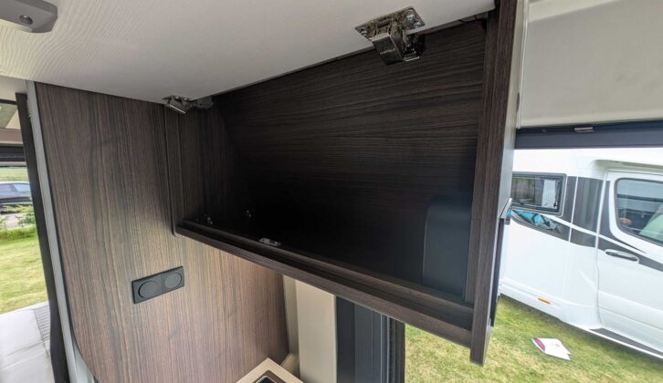 The overhead locker in the kitchen